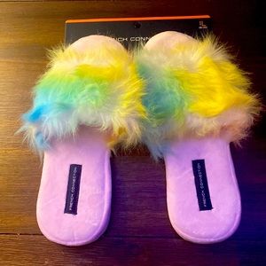 these are french connection fuzzy rainbow slippers. In size L (9/10). Brand new.